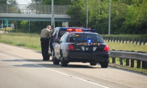 Police giving someone a Traffic Ticket for speeding in Lutz